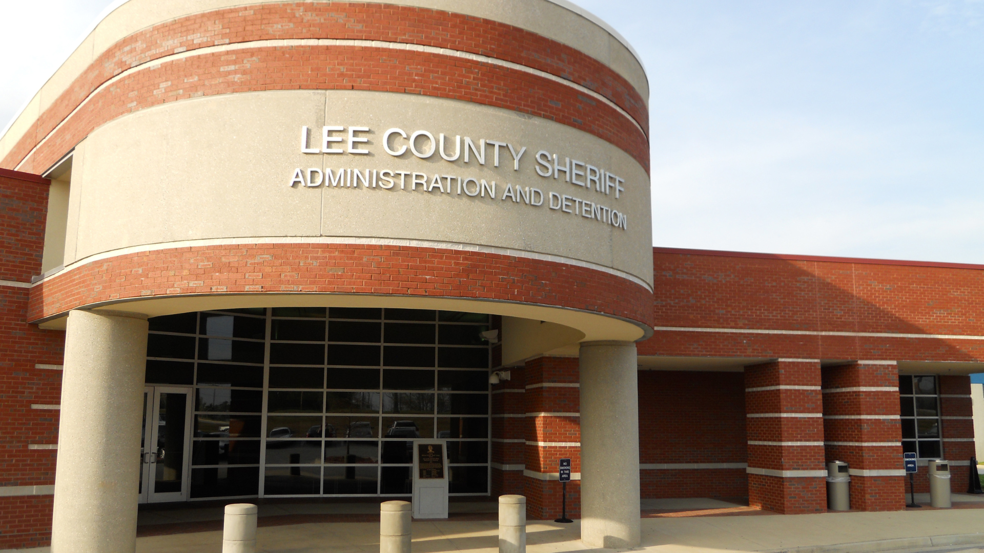 Lee County Sheriff Administration and Detention building with the American and Alabama flags out front