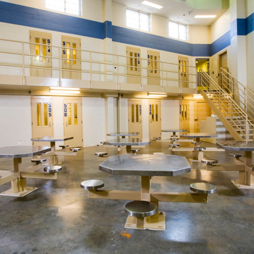 Housing unit dayroom inside the Lee County Detention Center